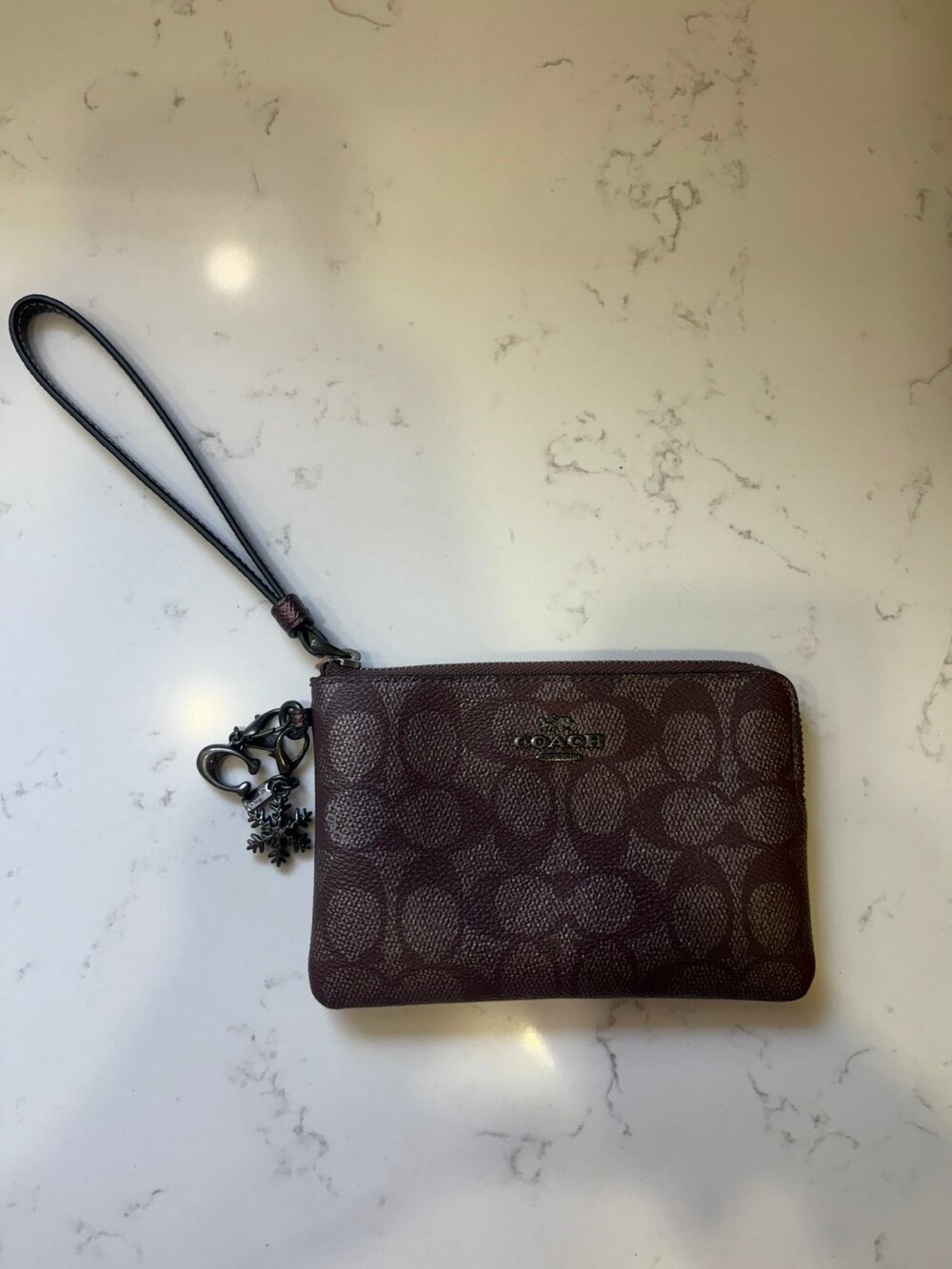 COACH Corner Zip Wristlet In Signature Canvas With Charms